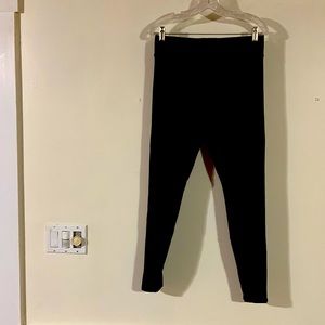 Black rayon/polyester/spandex leggings.